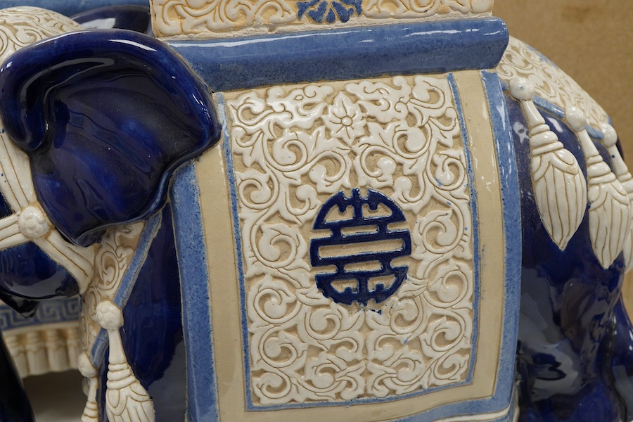 A pair of Chinese glazed earthenware 'elephant' stands, 42.5cm